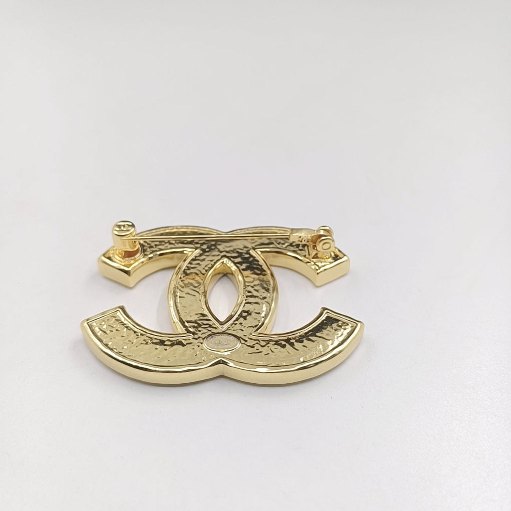 18K  Chanel Black Brooch