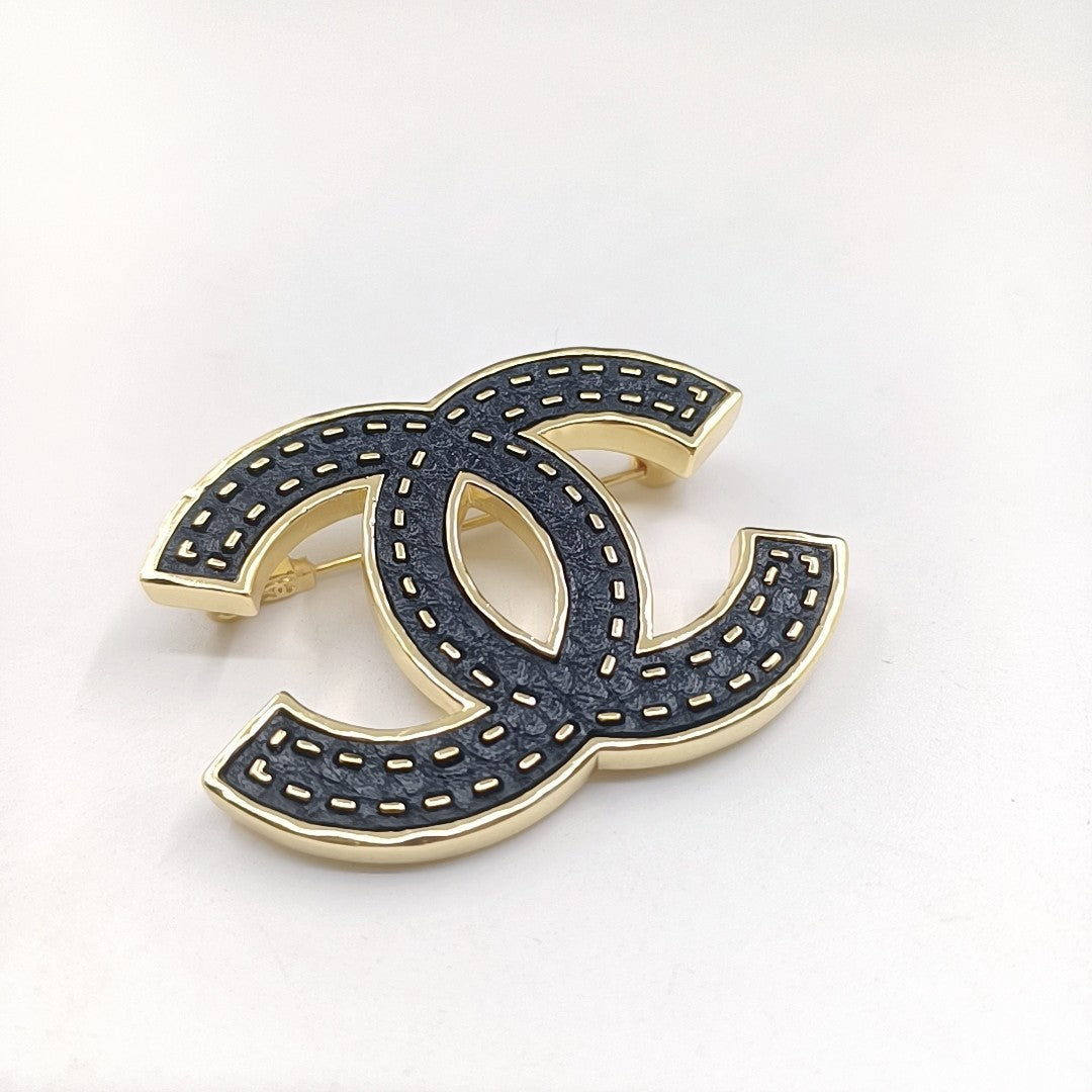 18K  Chanel Black Brooch